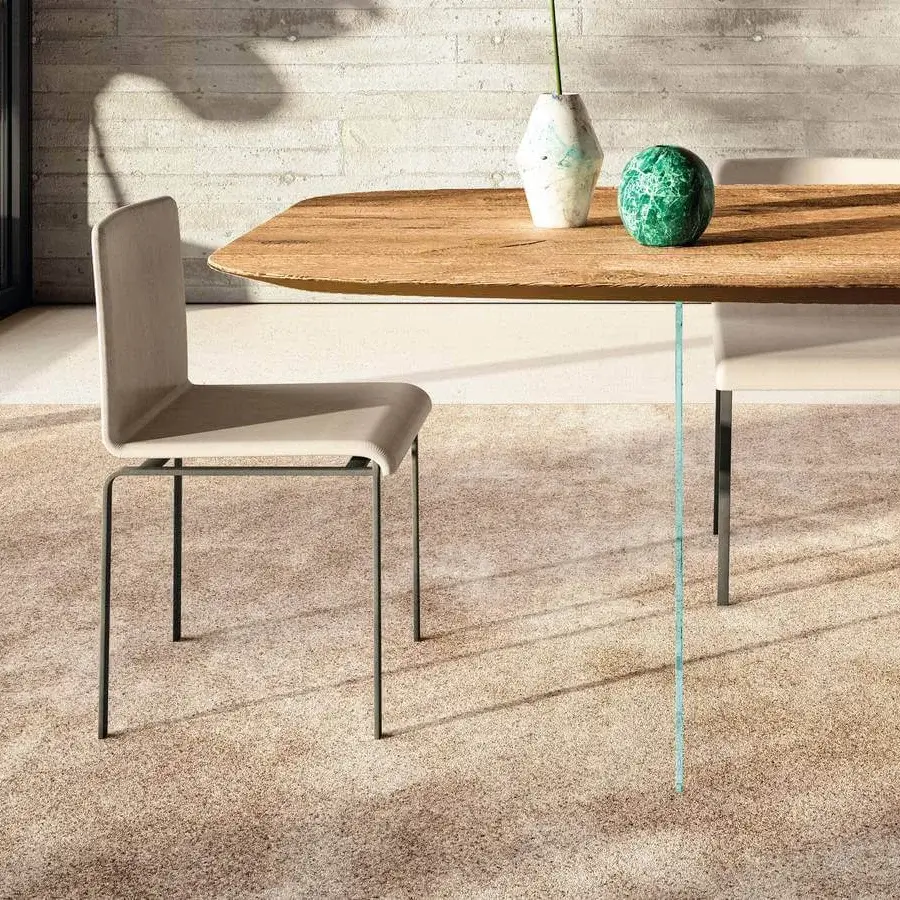 Elegant Lago Dangla chair with light beige textile and a robust dark metal frame with matte finish