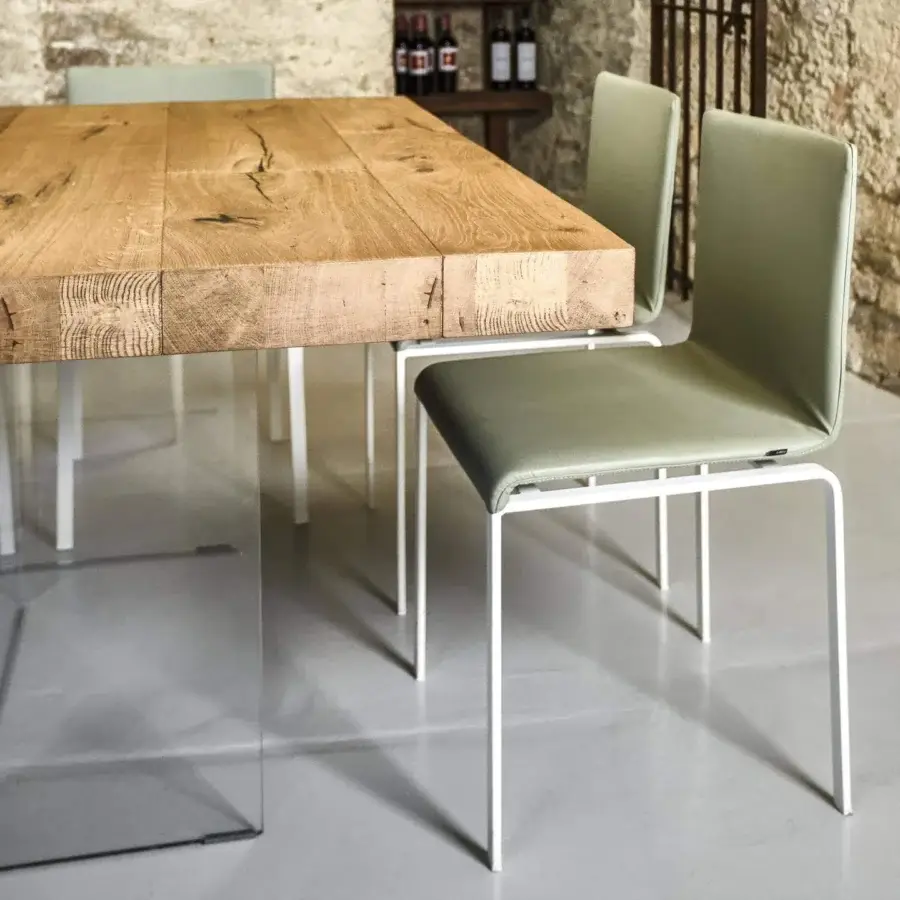 Distinguished Lago Dangla chair with white metal frame and light green upholstery presents a contemporary aesthetic for comfortable ergonomic support