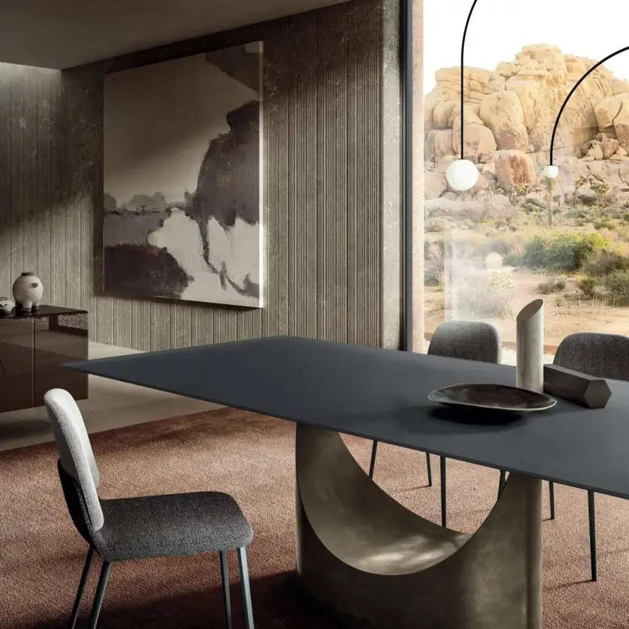Lavish Lago Ermes chair with upholstered seat and curved back in gray textile, built with a dark finished metal structure