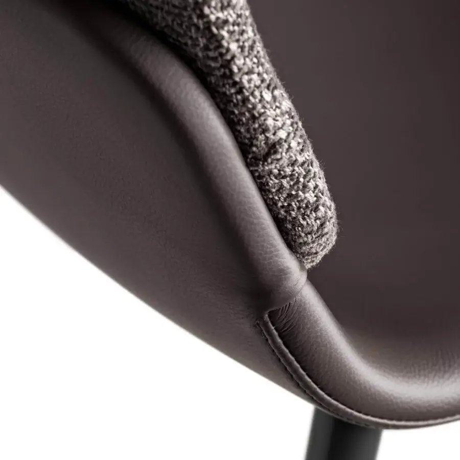Captivating Lago Ermes chair with dark brown leather-like material and textured grey white woven textile upholstery built with shaped metal