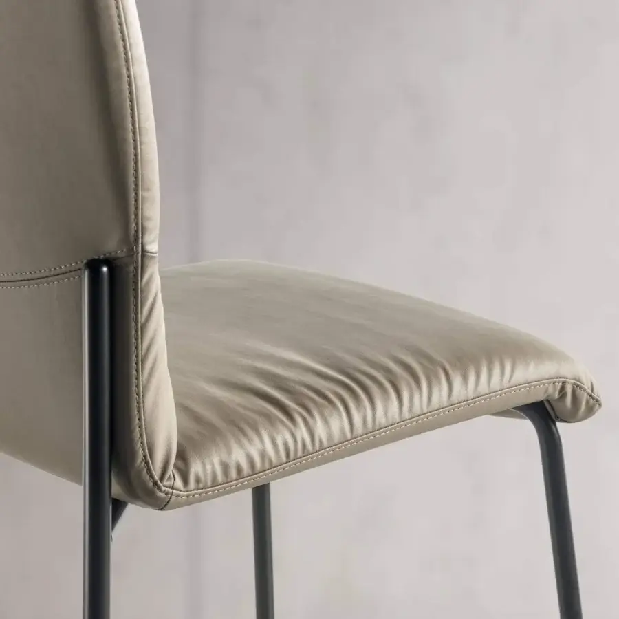 Exceptional Lago Woop chair with geometric light beige leather upholstery and dark gray steel frame