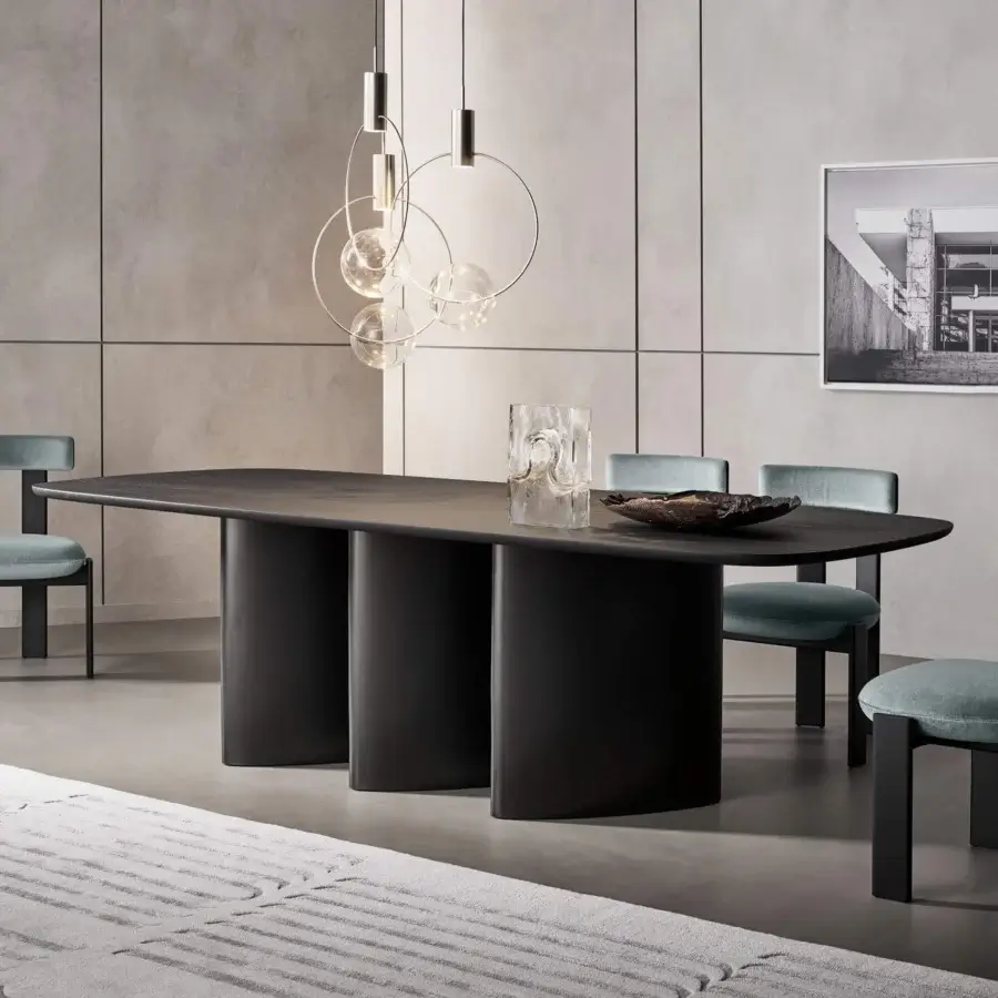 Distinguished Bonaldo Louver table with wooden construction, curved lines and dark matte finish creating sculptural legs