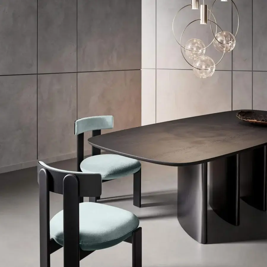 Exceptional Bonaldo Louver table with a rounded rectangular tabletop and cylindrical legs in dark wood finish