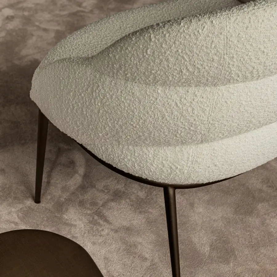 Superior Cattelan Italia Camilla lounge chair upholstered in soft off-white boucle fabric with bronze finished metal legs