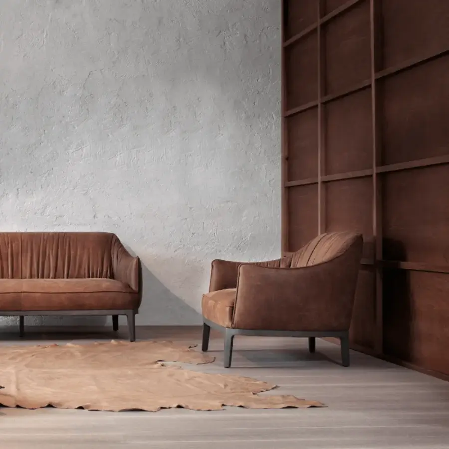 Sophisticated Potocco Blossom lounge chair with solid ash wood base and warm brown textile upholstery with pleated detailing