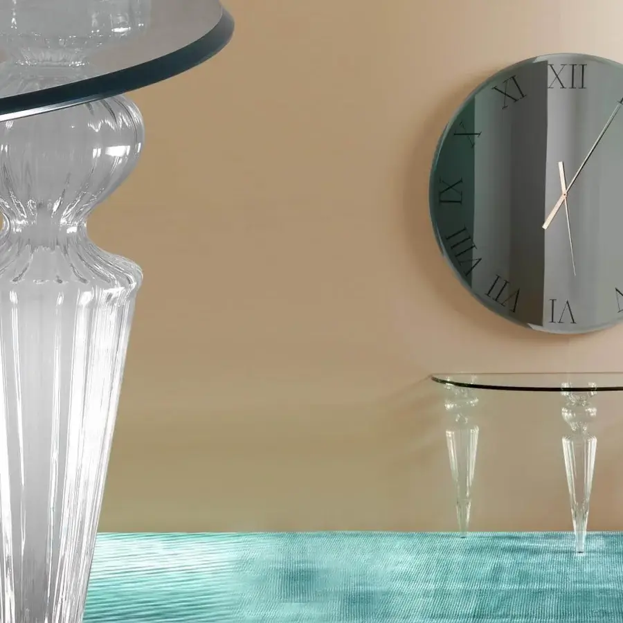 Superior Reflex Gran Canal console crafted with shaped clear glass, a beveled edge, and three Murano glass legs