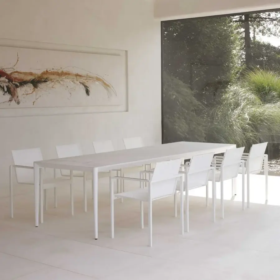 Distinguished Royal Botania Alura armchair crafted with lightweight aluminum, white textured finish and breathable mesh seat