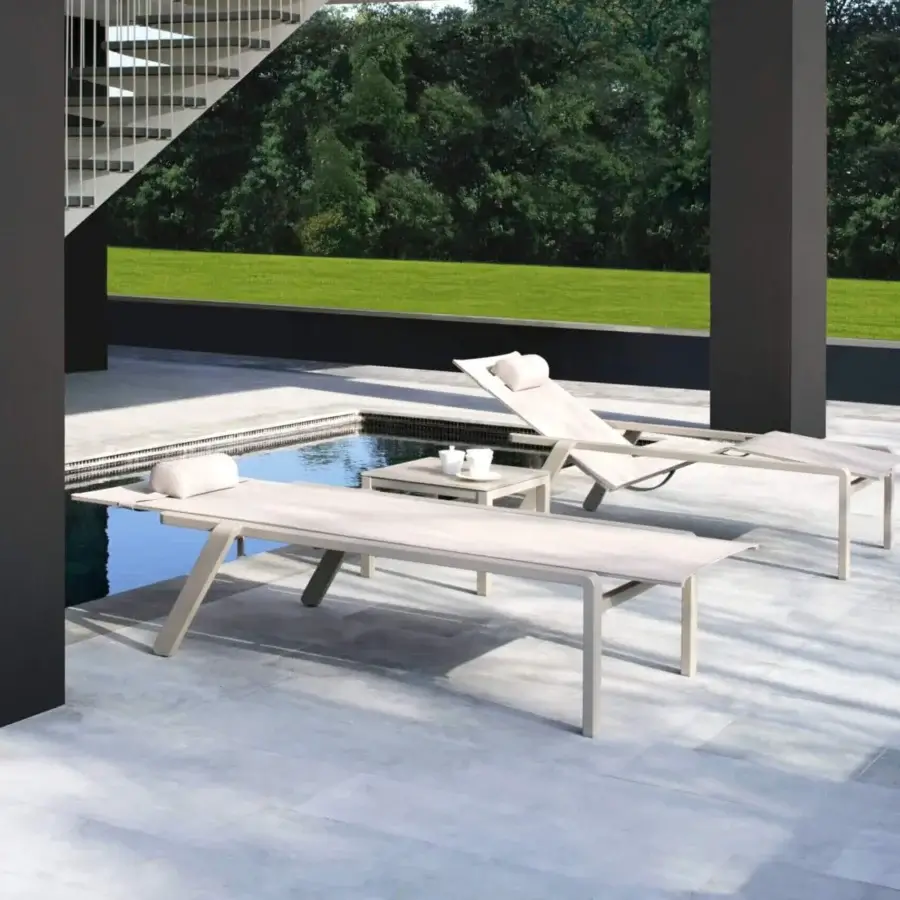 Superior Royal Botania Alura lounger with a sleek modern design and matte metal finish in a light neutral tone