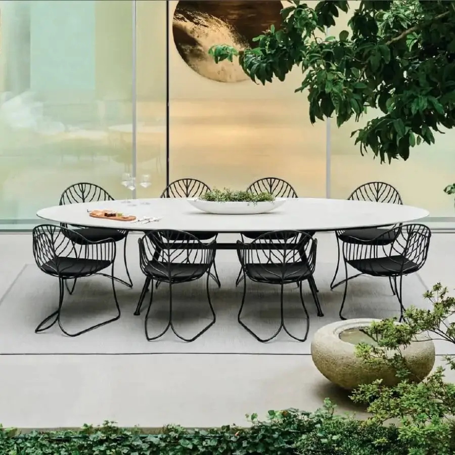 Distinctive Royal Botania Folia armchair with matte black metal and black cushioned seat exhibiting sculptural design inspiration