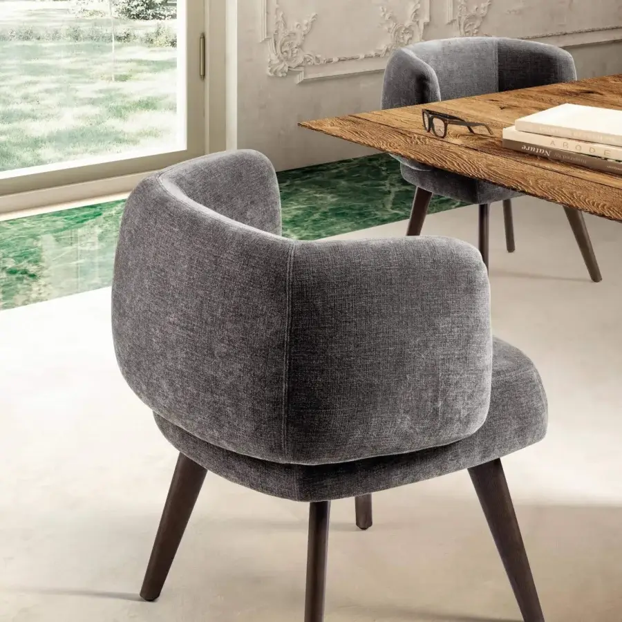 Sophisticated Lago Zeppelin armchair with ergonomic form, matte gray textile upholstery and dark brown cylindrical wooden legs
