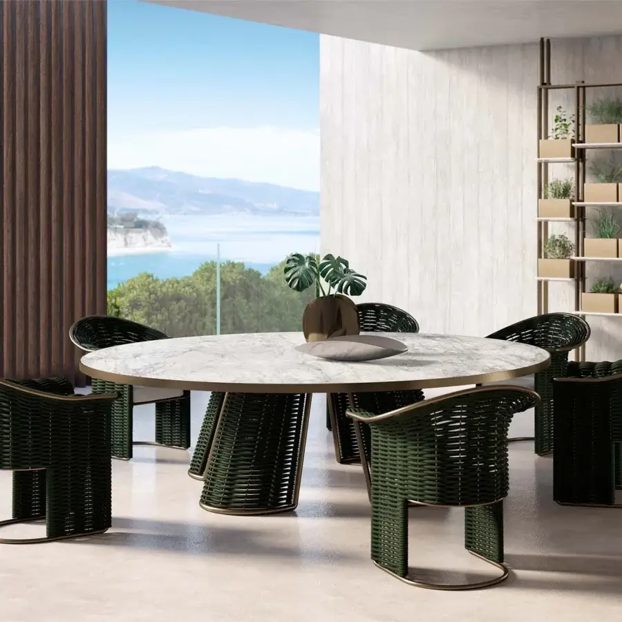 Exceptional Rugiano Marina Royal table crafted with light gray marble-like tabletop, metallic trim, and woven dark green rope base with bronze accent