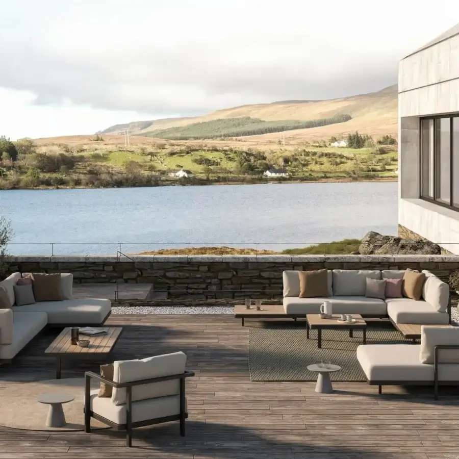 Exceptional Royal Botania Alura lounge chair with light cream cushions and a matte metal frame