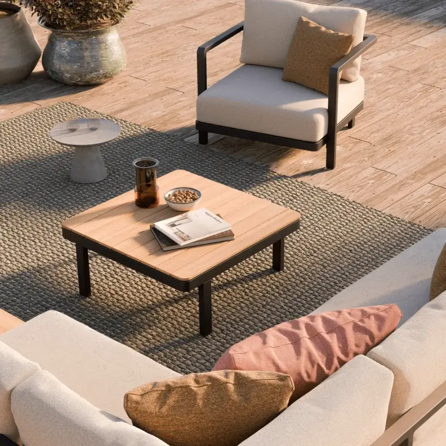 Elegant Royal Botania Alura lounge chair with light beige textile cushions and a dark gray frame