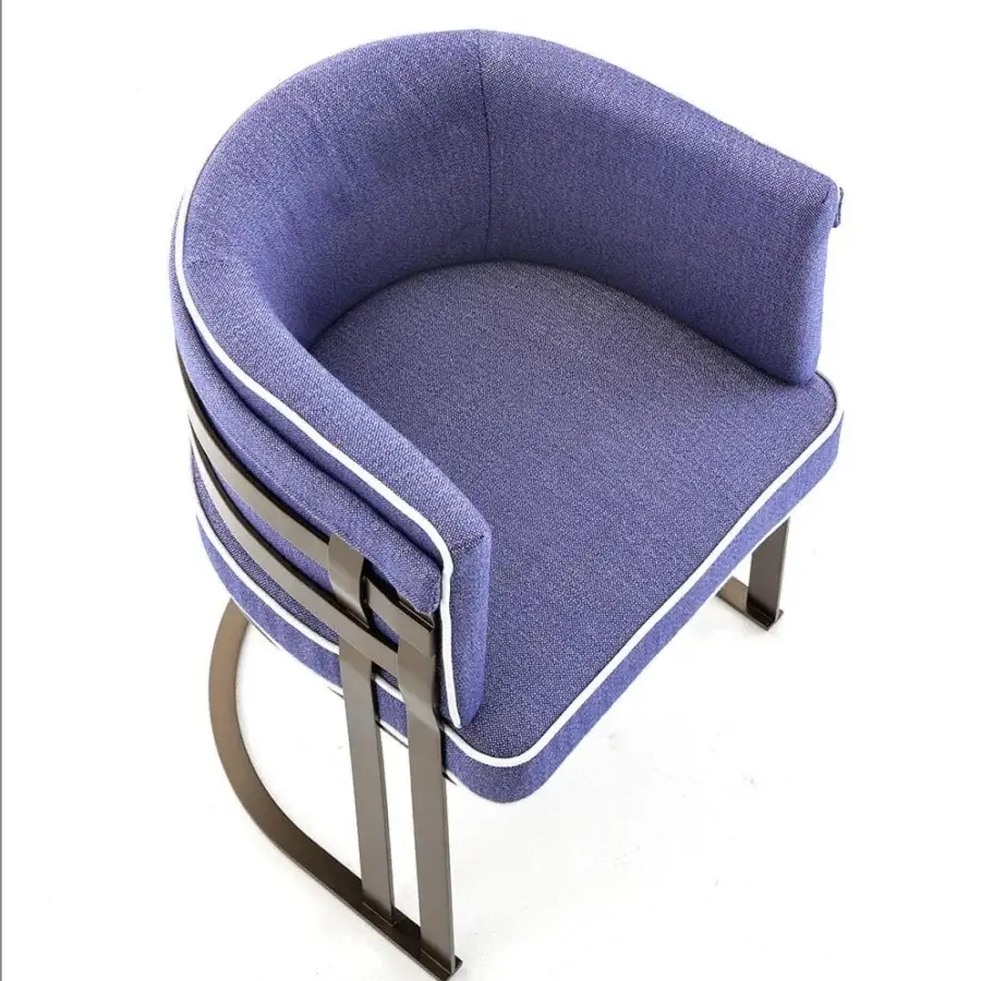 Distinguished Rugiano Arena armchair with curved blue textile upholstery and dark bronze finished metal frame