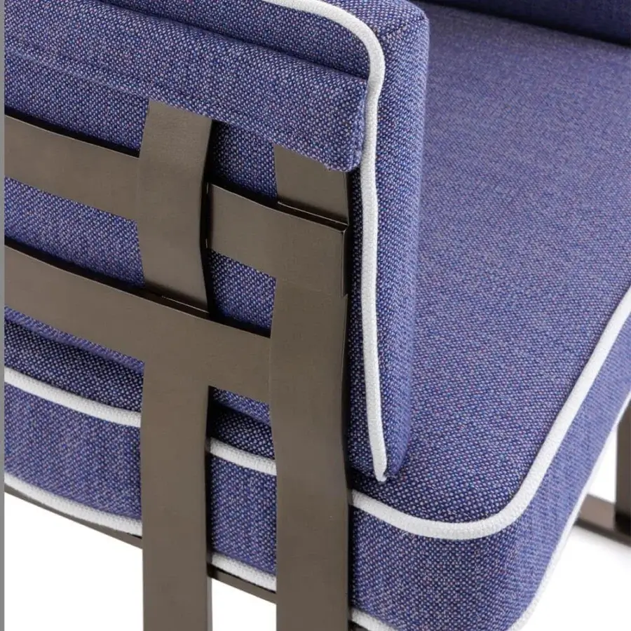 Meticulous Rugiano Arena armchair with textured mixed blue and white fabric upholstery and Outdoor Bronze metal finish