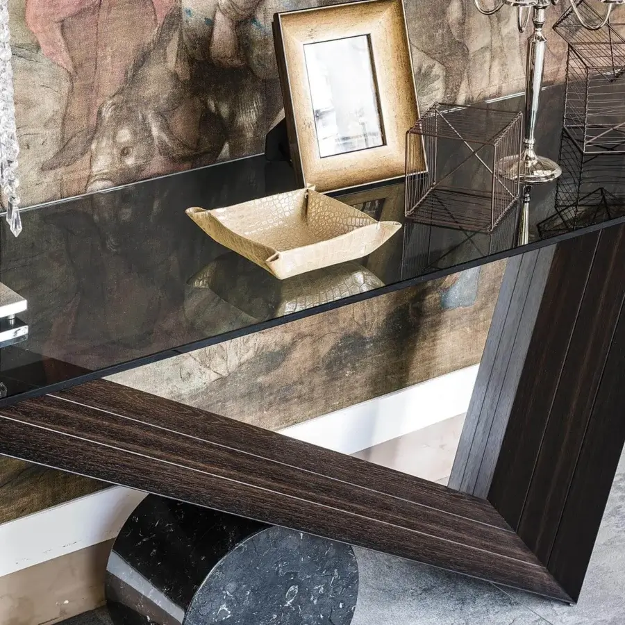Elegant Cattelan Italia Valentino console with Canaletto walnut and clear glass, built upon a black Marquina marble base