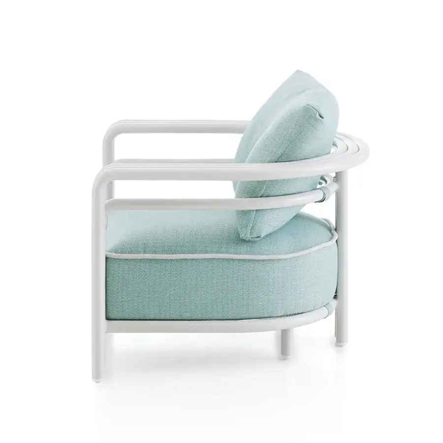 Elegant Rugiano Capri lounge chair with light blue textured cushions and sleek Sand metal frame crafted in Italy