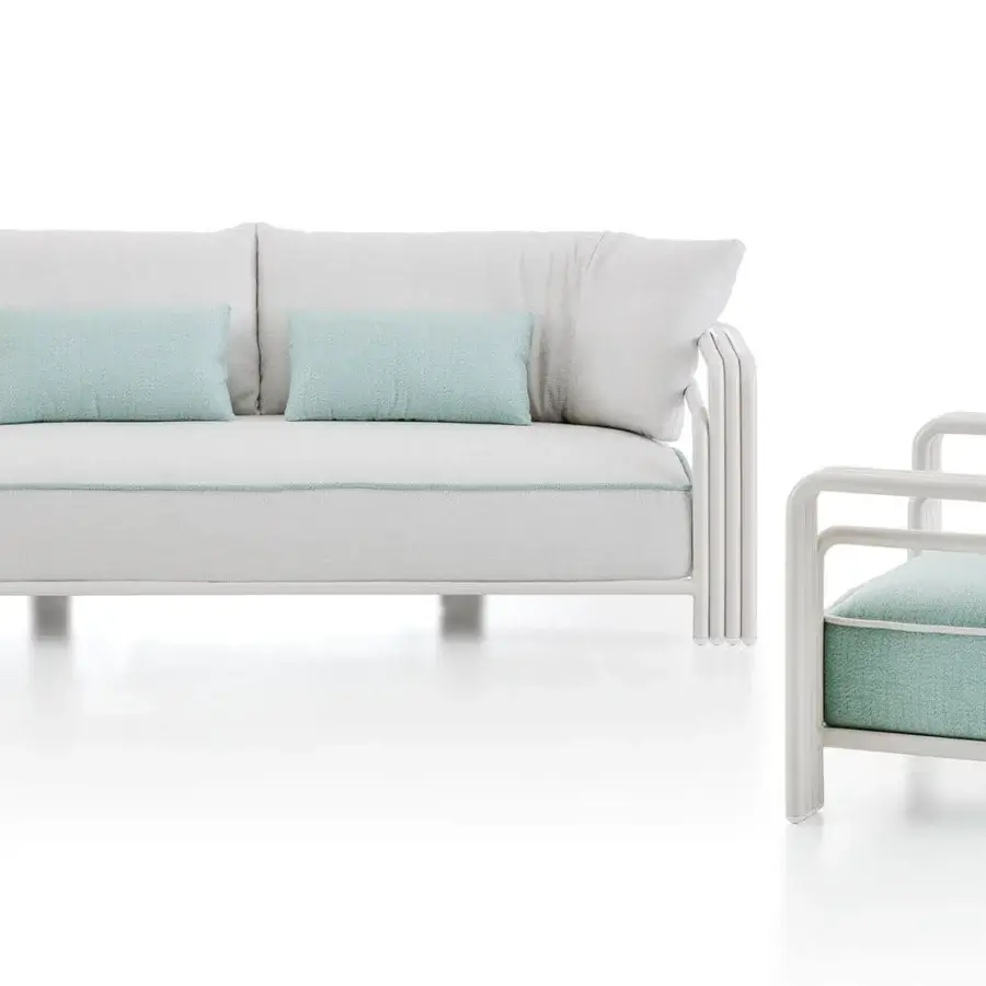 Distinguished Rugiano Capri sofa with light gray cushions accented by subtle light blue trim and geometric Sand metal frame