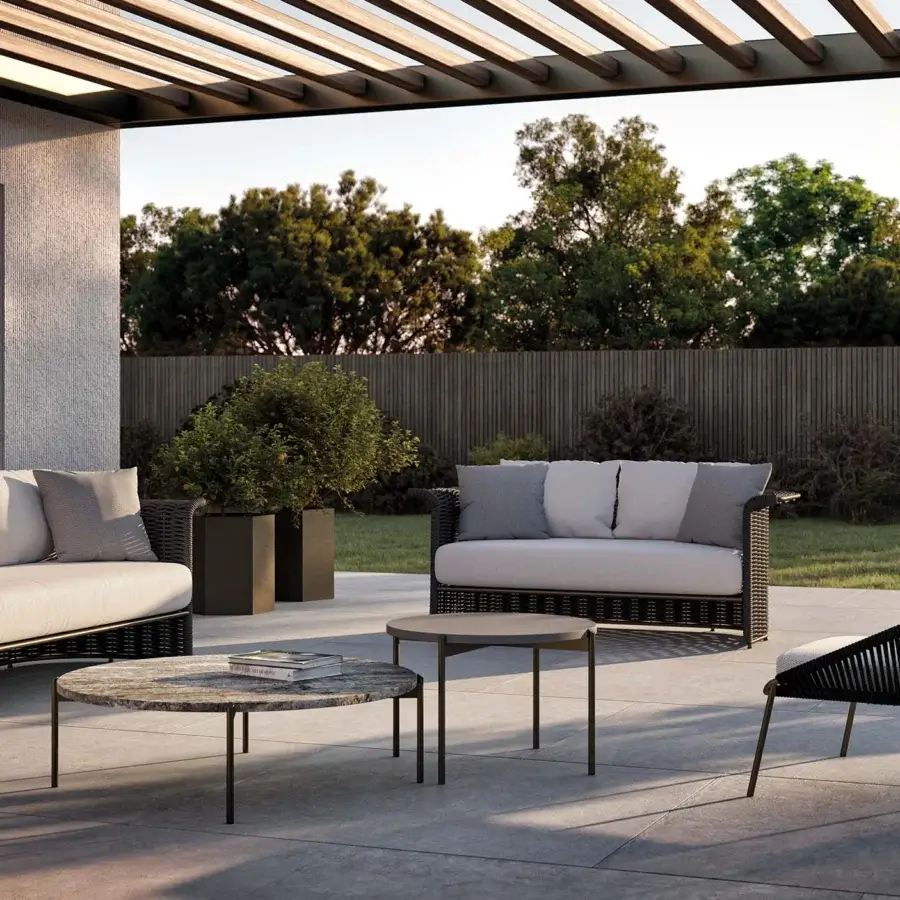 Exceptional Rugiano Marina sofa with a dark woven frame and light beige cushions embodying a modern style with rope accents