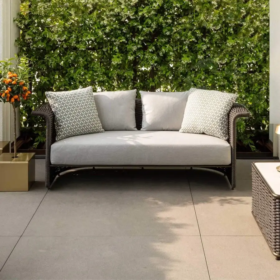 Superior Rugiano Marina sofa crafted in Italy with light grey textile and dark brown woven synthetic rope accents