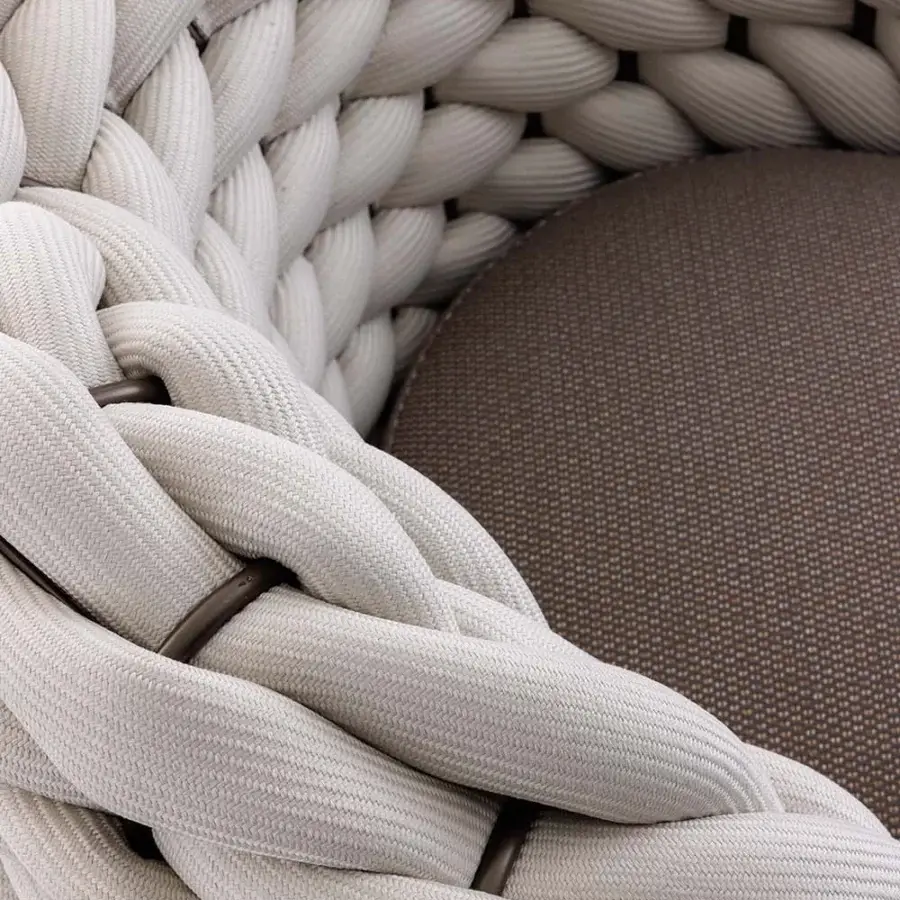 Superior Rugiano Nido lounge chair with light braided rope and sophisticated outdoor bronze metal structure, including a beige fabric cushion