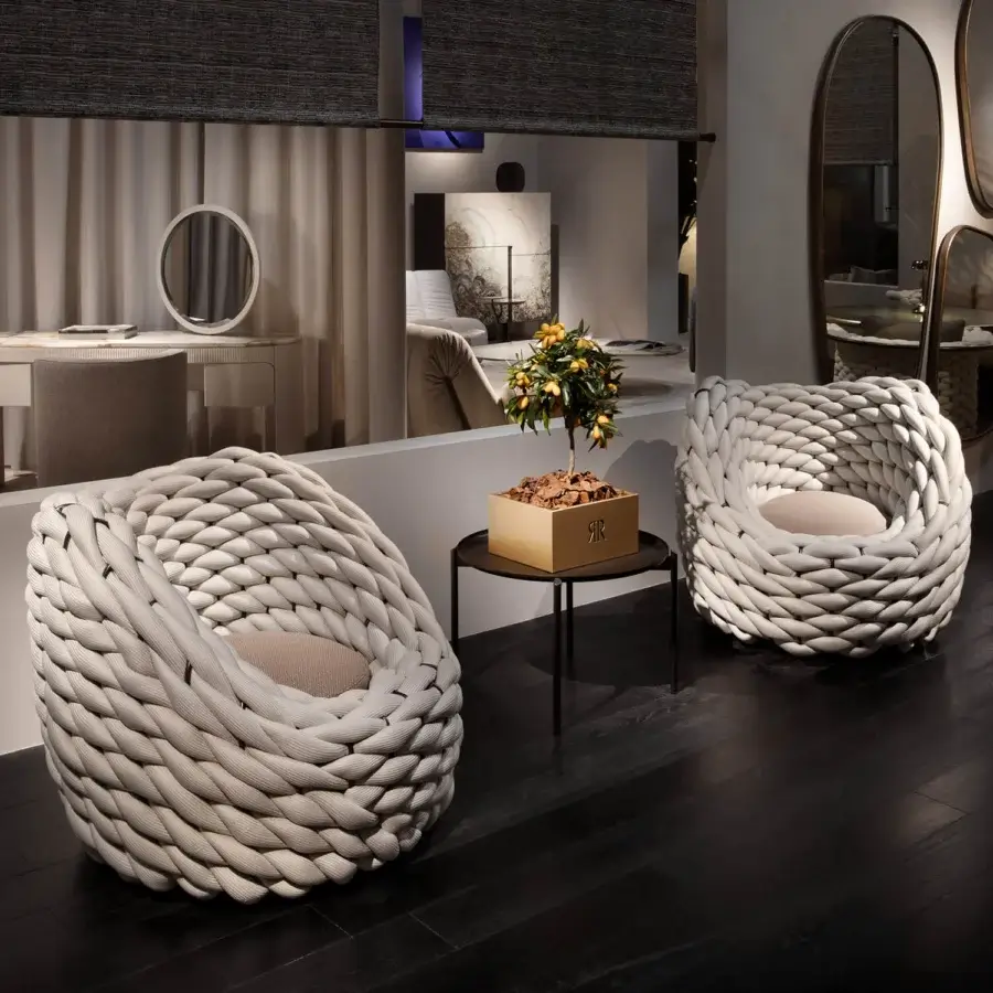 Exceptional Rugiano Nido lounge chair with a light beige tone, crafted in Italy with outdoor bronze metal and quality beige rope