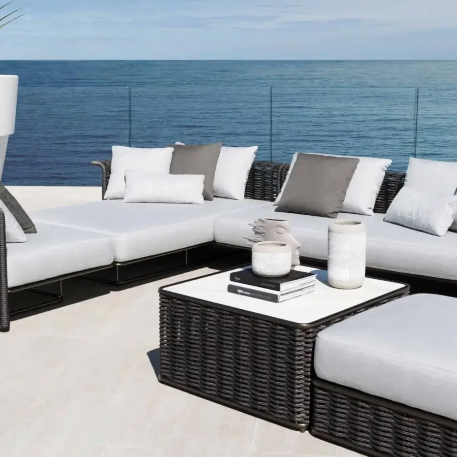 Lavish Rugiano Marina ottoman built with dark brown woven material and a light gray plush fabric cushion