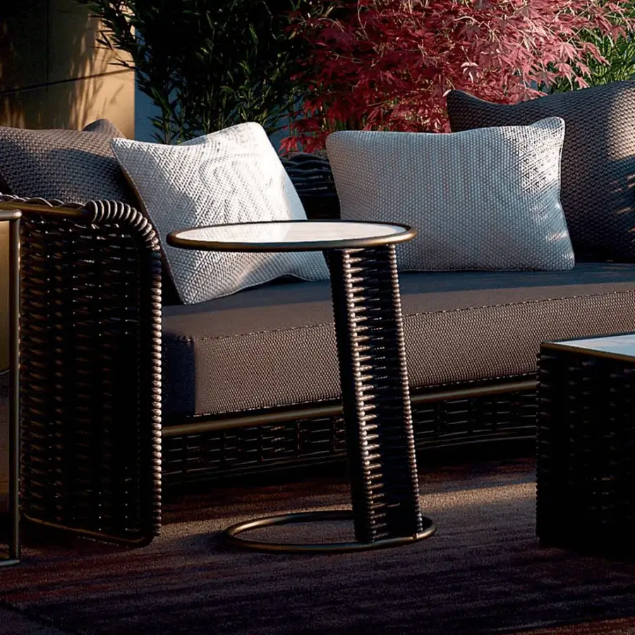 Distinguished Rugiano Sun coffee table with light technical marble and textured black woven rope built around a metal base