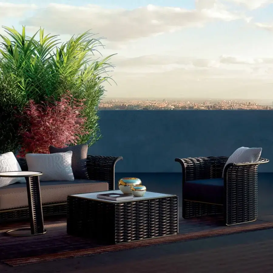 Exclusive Rugiano Sun coffee table crafted in Italy with dark woven base and light technical marble tabletop
