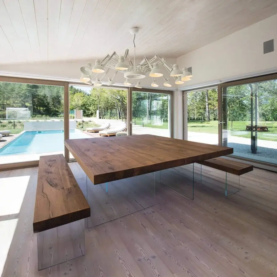 Exceptional Lago Air bench with a lightened solid oak plank seat and extra-clear glass supports in dark brown with a matte finish