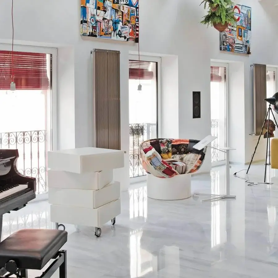 Distinctive Lago Soft Swing swing with lacquered wood and foam seat suspended by white ropes and smooth matte finish