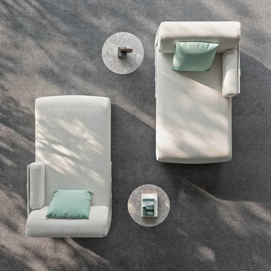 Elegant Rugiano Dafne chaise lounge with bronze painted aluminum basket and textured neutral textile upholstery with green accent