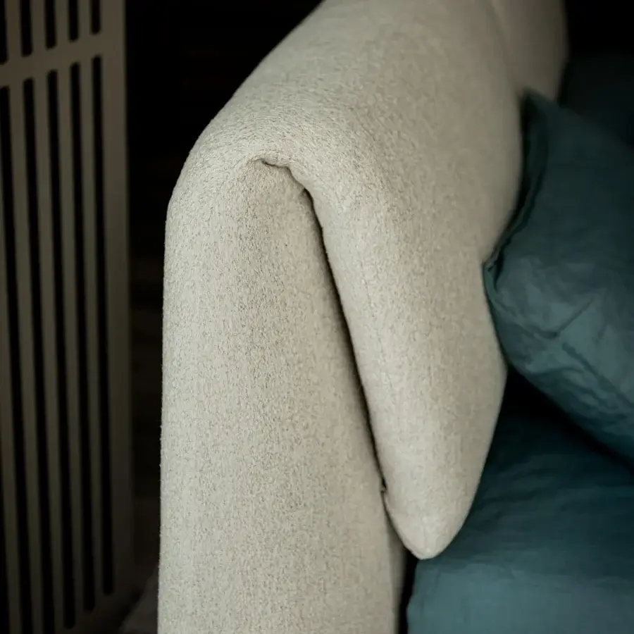 Exceptional Cattelan Italia Simon bed with curving headboard upholstered in light neutral textile and matte finish