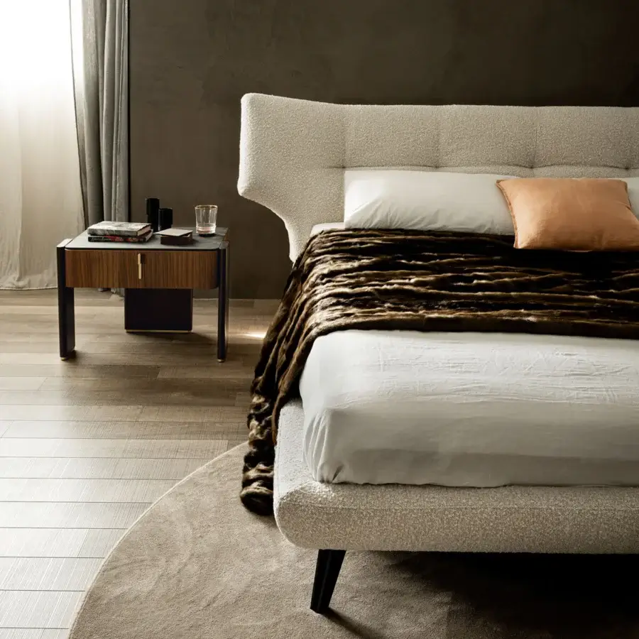 Exceptional Cattelan Italia Thomas bed with textured off-white fabric upholstery and quilted stitching on a raised frame with metal feet
