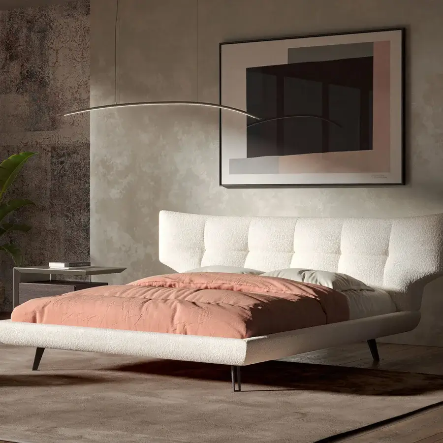 Distinguished Cattelan Italia Thomas bed with curved headboard upholstered in light cream fabric and metal feet