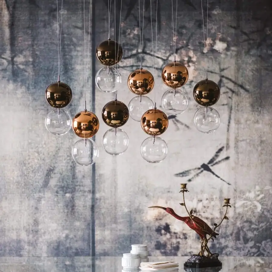 Captivating Cattelan Italia Apollo lamp with transparent and painted bronze borosilicate glass spheres and glossy metallic finish