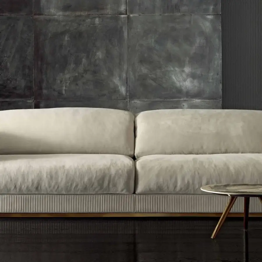 Superior Rugiano Vogue sofa displays a geometric form upholstered in neutral textile with matte finish and dark wood armrests