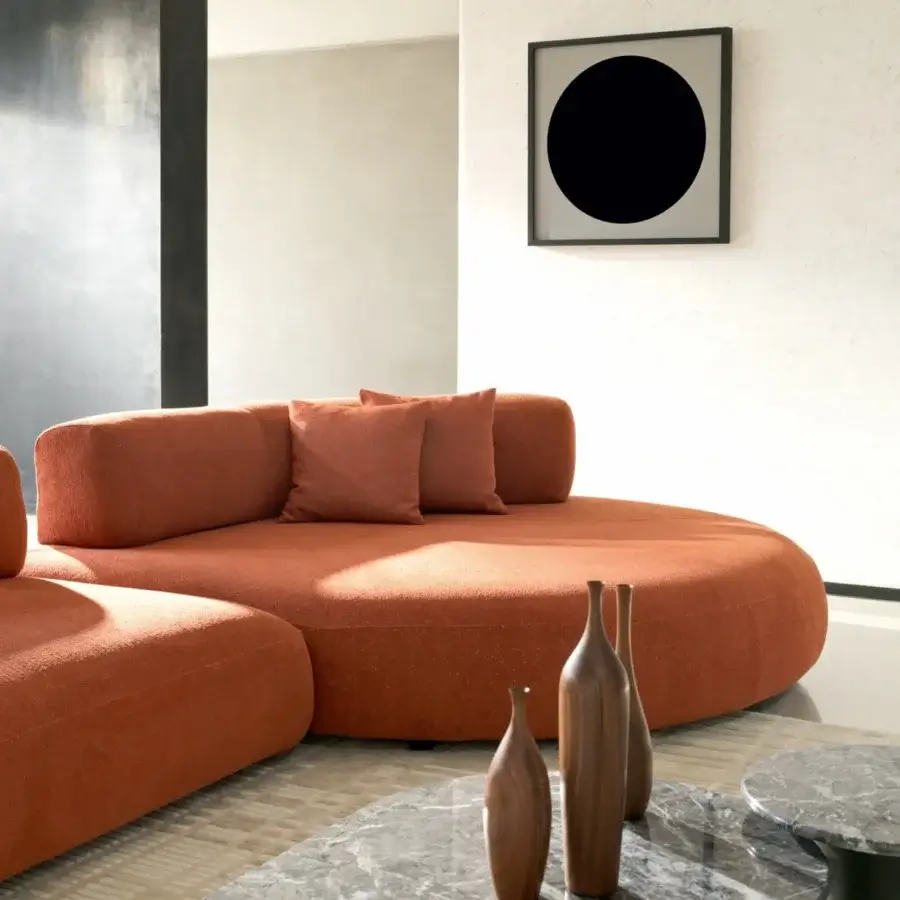 Distinguished Ditre Italia Isla sectional with inviting rounded forms upholstered in textured matte burnt orange textile