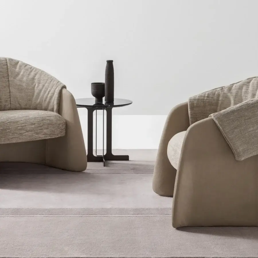 Harmonious Ditre Italia Blazer lounge chair upholstered in light beige textile with a matte beige synthetic base