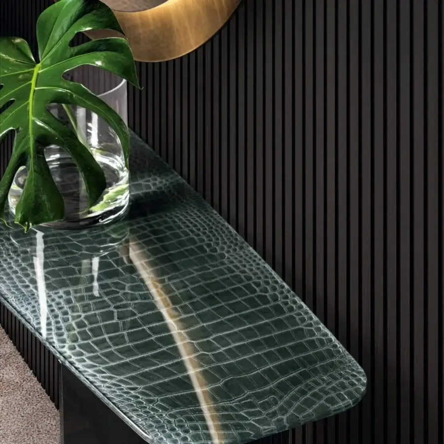 Distinctive Lago Deba console with reptile-like dark green glass surface and glass supports crafted for a floating effect