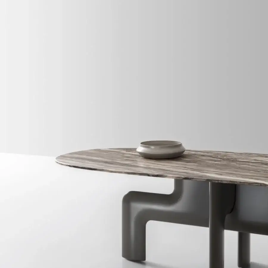 Elegant Ditre Italia Biarritz table with a rounded rectangular top in brown streaked marble-like material and dark gray angled legs