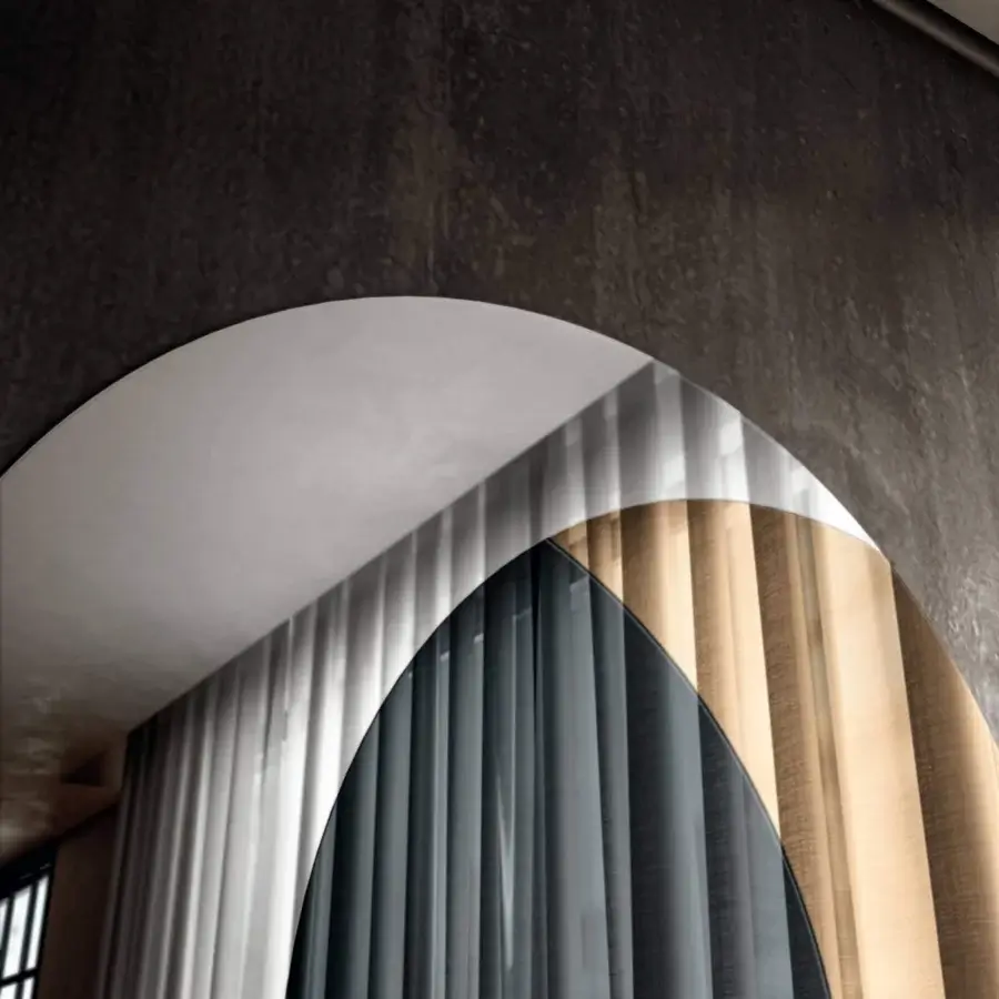 Architectural Lago Fuze mirror with coplanar forms creating a captivating illusion in sleek glass crafted in Italy