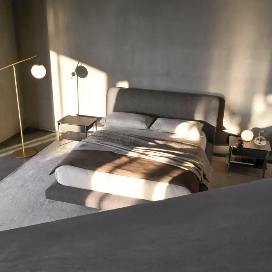 Distinguished Ditre Italia Avalon bed with matte gray textile upholstery and subtle bands detailing its frame