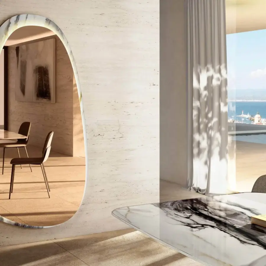 Superior Lago Era mirror with organic stone-inspired shape in XGlass featuring swirling white, gray and tan finish built with LED lighting
