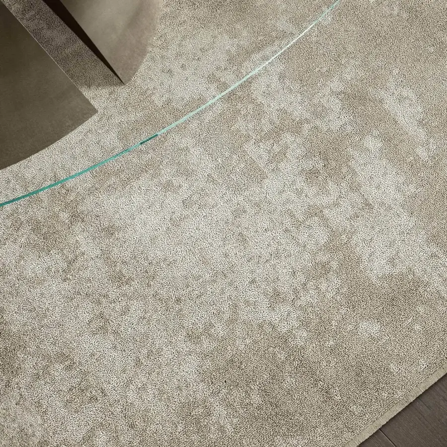 Distinguished Lago Ammos rug crafted in Italy with durable technical materials exhibiting beige and light brown textured coloration