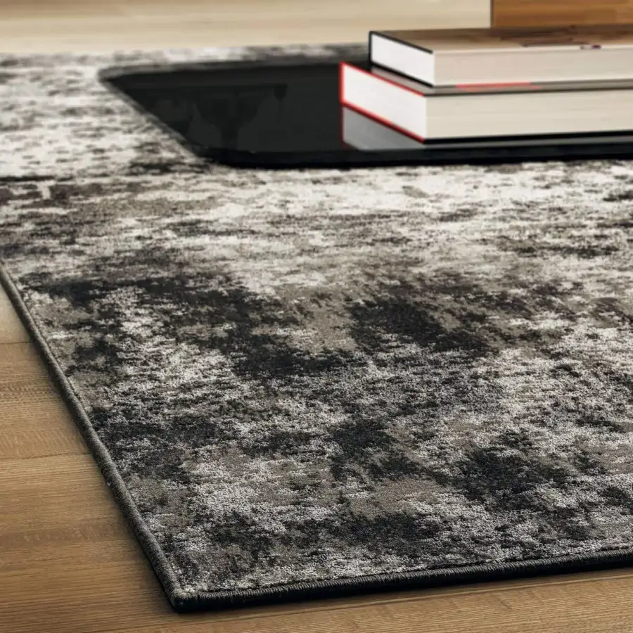 Distinguished Lago Dive rug crafted in Italy with blended gray and black hypoallergenic materials and minimal finish