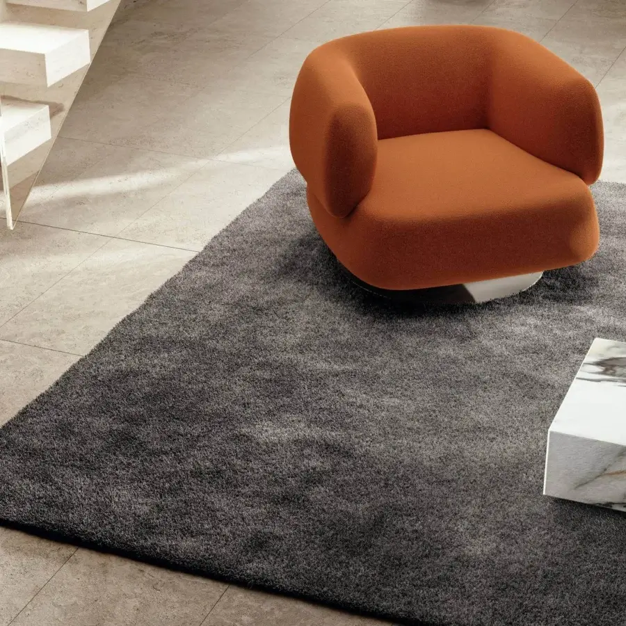 Lavish Lago Kipo rug crafted with subtle tonal variations in dense shaggy gray textile delivering understated elegance