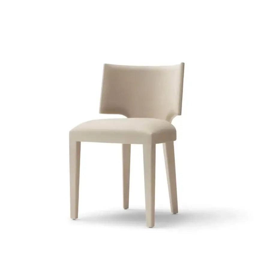 Refined OAK Nolita chair with enveloping backrest and essential leg lines in a smooth matte beige finish