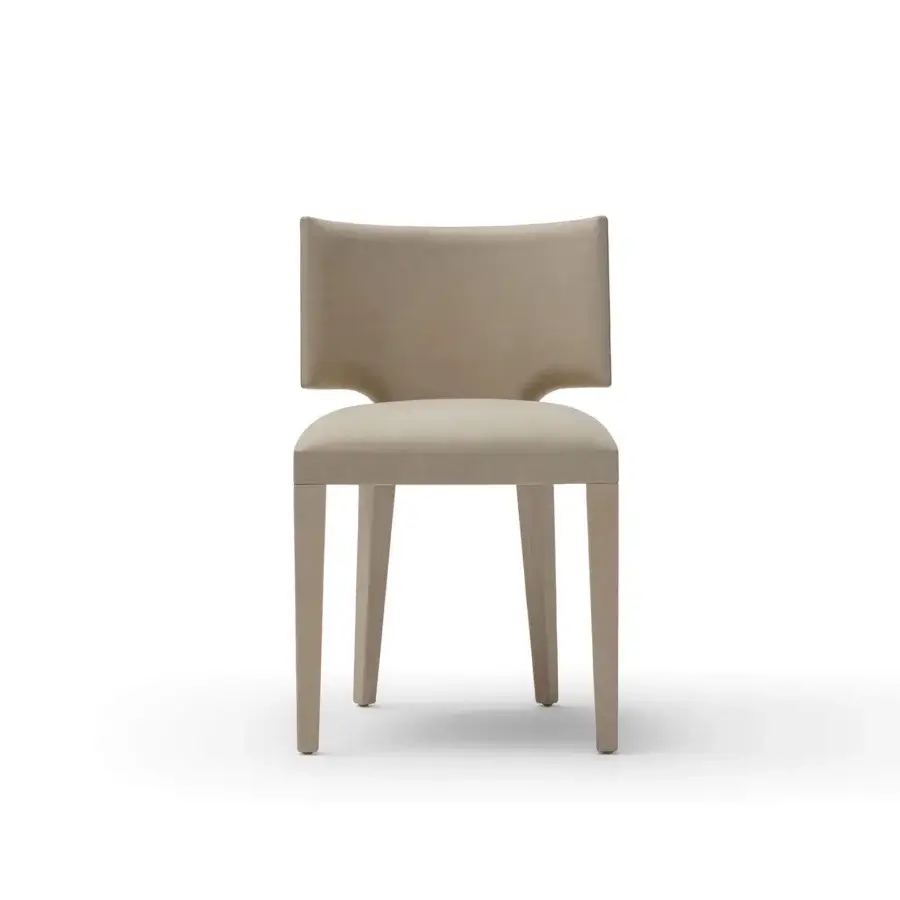 Elegant OAK Nolita chair upholstered in uniform beige textile with slender light-wood legs for modern comfort