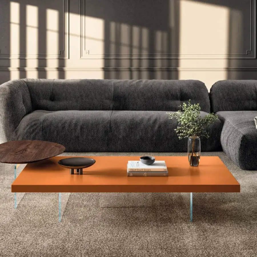 Distinguished Lago Air coffee table with tempered glass supports and matte uniform orange lacquered finish